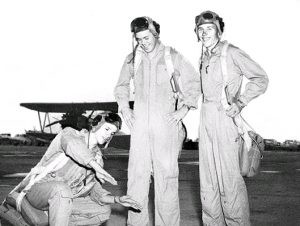 left to right:  H. L. “Bob” Neely, Joe Kane, and Emery Campbell Rodd Field Corpus Christi, Texas(note Stearman in background)
