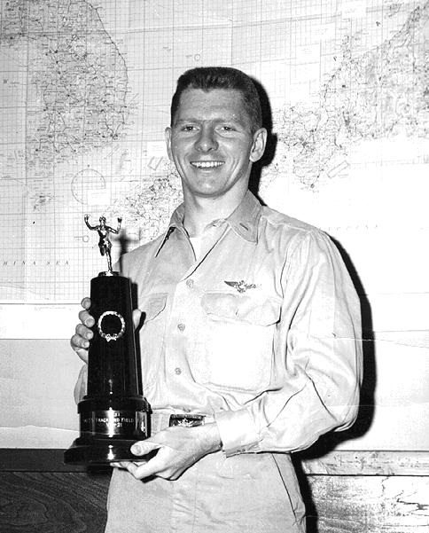 Frank Nulton, ENS, USN     As Coach and competitor at Haneda, AFB Tokyo, Japan, Track and Field Day, 6 June 1951, Frank Nulton leads team to victory over 3,500 Air Force Personnel on Base. VR-21 DET. Haneda had about 90 Naval personnel assigned. The Navy proves again it’s not the numbers … it’s the quality.  Fleet Logistic AIR WING PACIFIC  AIR TRANSPORT SQUADRON TWENTY-ONE DETACHMENT