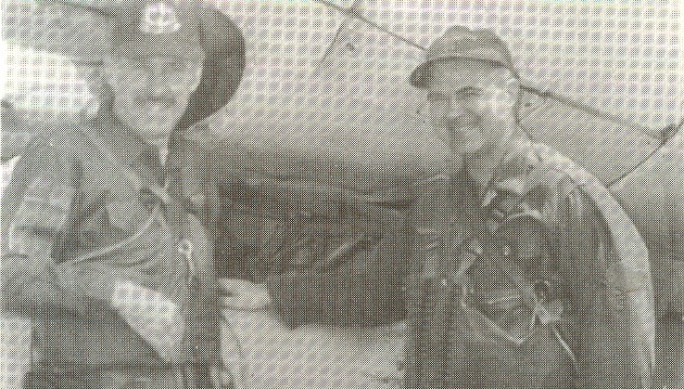 Wings of Gold spring 2000  Spring of 1966 aboard Hancock, Carlton, left, with Barn Owl CO, CDR Frank Nelson during Yankee Station operations  