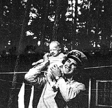 LTjg Gerald Joseph Parent with son,  Joseph A. Parent    Piney Woods, Maryland  (NAS Patuxent River, Maryland)    about October 1953