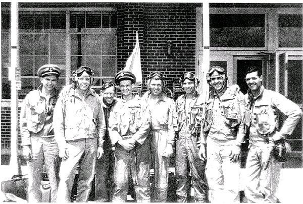 left to right: Mid’n 1/C Ernest H. Schorz, Mid’n #149, Mid’n 1/C Glenn L. Allen,24 April 48 Jr., Lt(JG) Jimmy Price – instructor, Mid’n 1/C William R. O’Neill, ENS Walter Shirra, USN, Mid’n 1/C Lawrence C. “Wump” Warren #151, ENS R. A. Gosnell, USNR, Mid’n 1/C John W. Reid, Jr.,  Mid’n #150