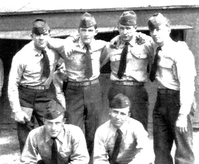 Picture with 6 "handsome devils": taken NAS Saufley Field, Pensacola, Florida.    Gunnery Phase of SNJ Basic Flight Training        all Aviation Midshipman 2nd Class    left to right (standing): 	George E. R. "Gus" Kinnear, Bill Quarg, Robert "Hop" Holden, H. L. "Hal" Marr    kneeling 	Jim Hummel (left) and R.  L. "Sport" Horton