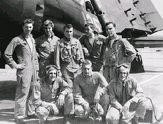 FLT 8 and Instructor                   left to right: Bob Aumack (later a Blue Angel), Ralph Tvede, CAPT B. J. Frankovic, Bob Ceremsak, Bud Wilkerson, Dick Kaufman, Dick Kapp (killed in a Corsair while training in a fleet squadron on the east coast in 1950), and George Strickland (first Mid’n in battle since the War of 1812).    NAAS Cabannis Field    February 1950