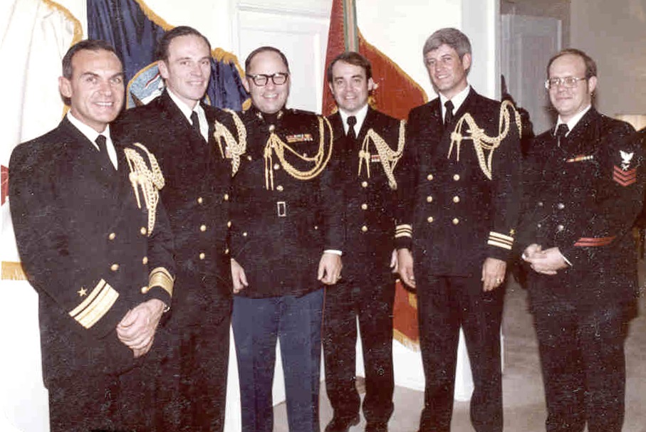 Defense Attaché Naval Staff  Moscow, USSR              left to right: RADM Gene Sizemore, Defense Attaché, CAPT George Montgomery, Naval Attaché, LCOL Paul Roush, USMC, LCDR Mike Kramer, Assistant Naval Attaché, LCDR John Williams, Assistant Naval Attaché, and Petty Officer 1 Bruce Berg, Office Assistant          1980