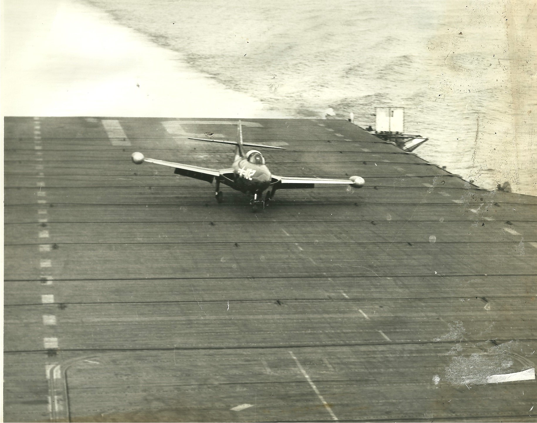 VF-781 F9F #102 Broken landing gear on BHR 30 Mar 1951. USN Restricted.