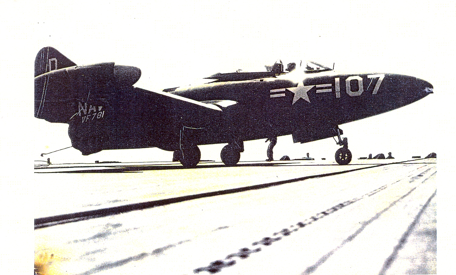 VF-781 F9F-2 taxiis out of arresting gear on BHR - Korea 1951