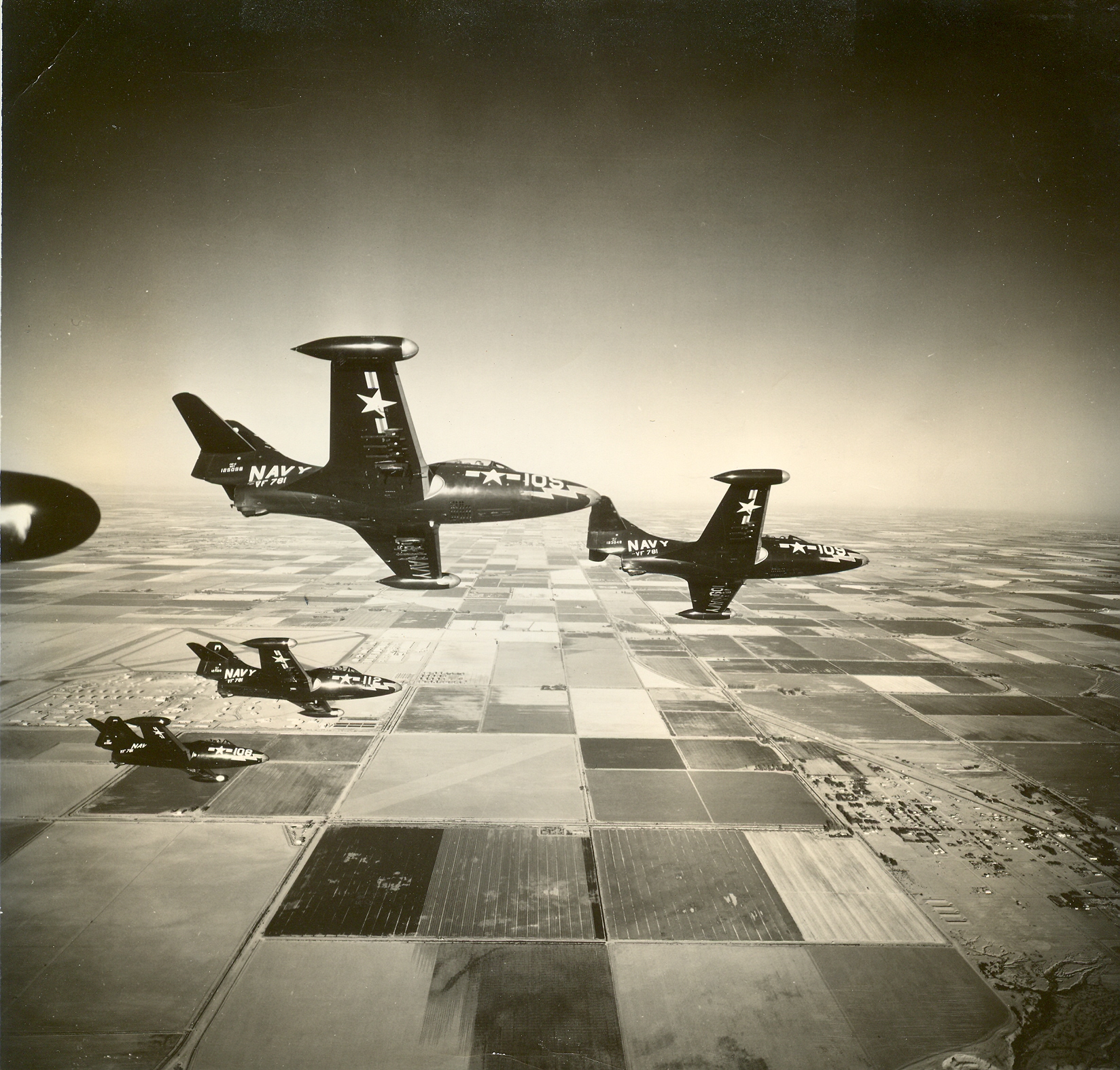 VF-781 F9F-5s over NAAS El Centro, Aug 28 1952, LTJG Jerry McCabe leads - US Navy Photo